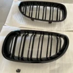 bmw e60 e61 dvigubos grotelės su defektu iš arti