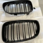 bmw e87 e88 e81 e82 lci dvigubos grotelės juodos blizgios su defektu iš arti