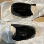 BMW E9X E8X LCI veidrodėlių dangteliai, blizgūs juodi (defektas)